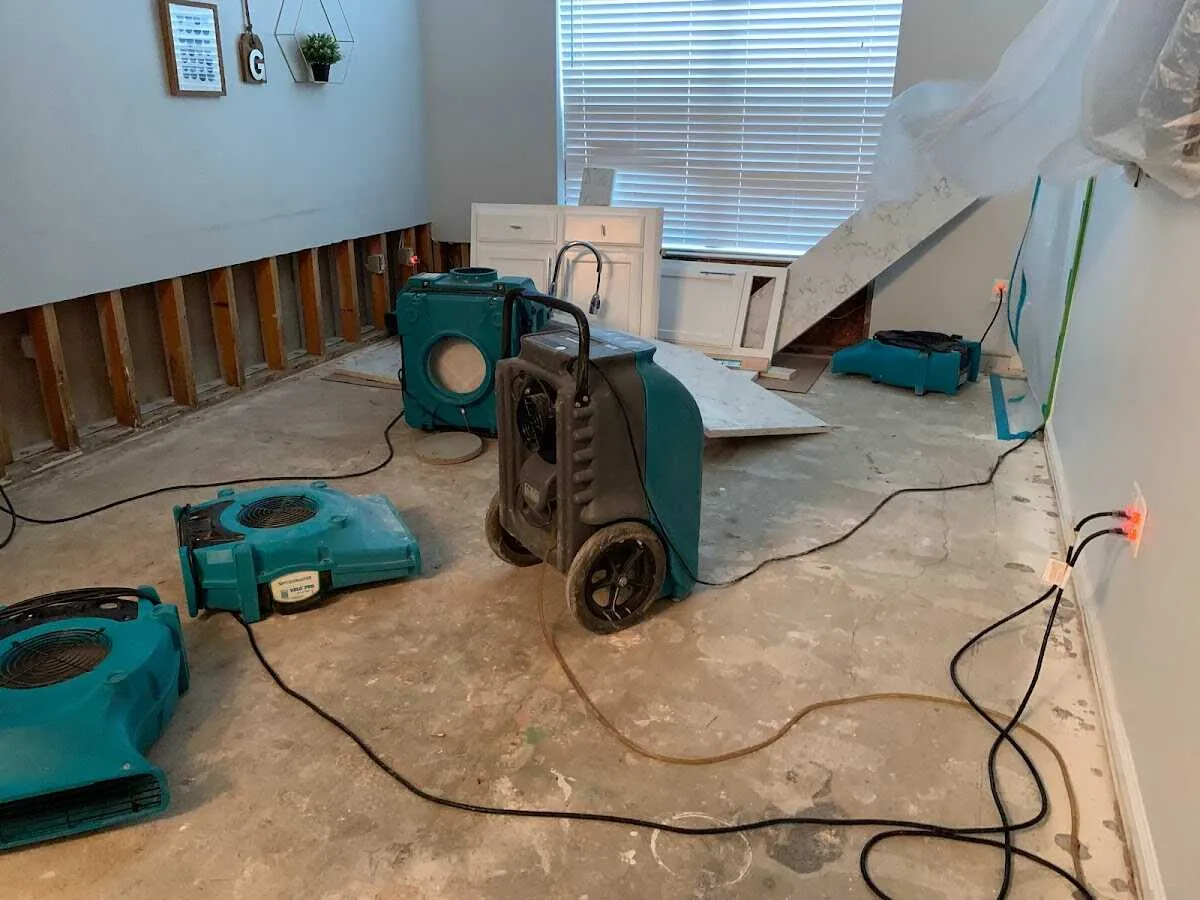 Dehumidifier in flood-cut room for Water Damage Restoration in Rockton